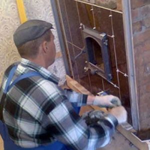 Выполним укладку плитки на печку